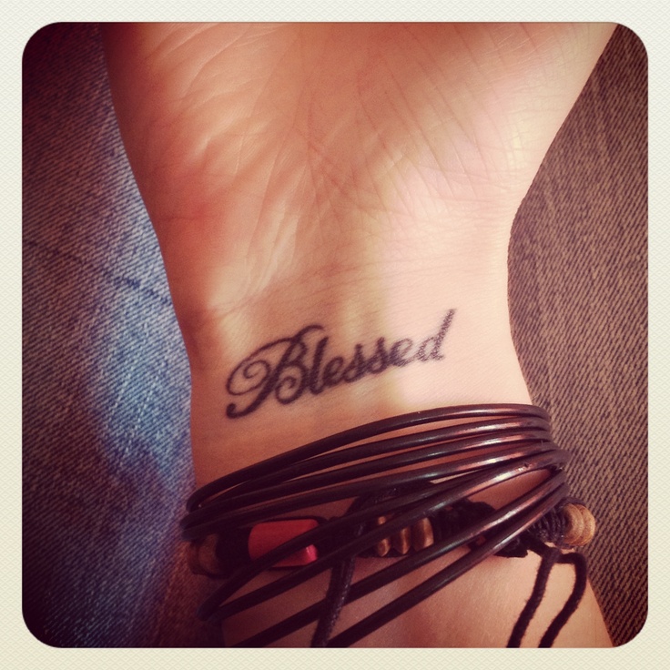 Women Tattoo - Blessed but on top of my wrist. 