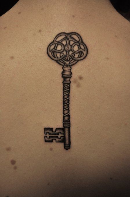 Geometric Tattoo - Outstanding Skeleton Key Tattoo On Upper Back ...