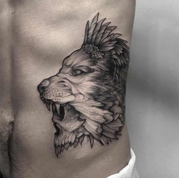 rib cage lion tattoos