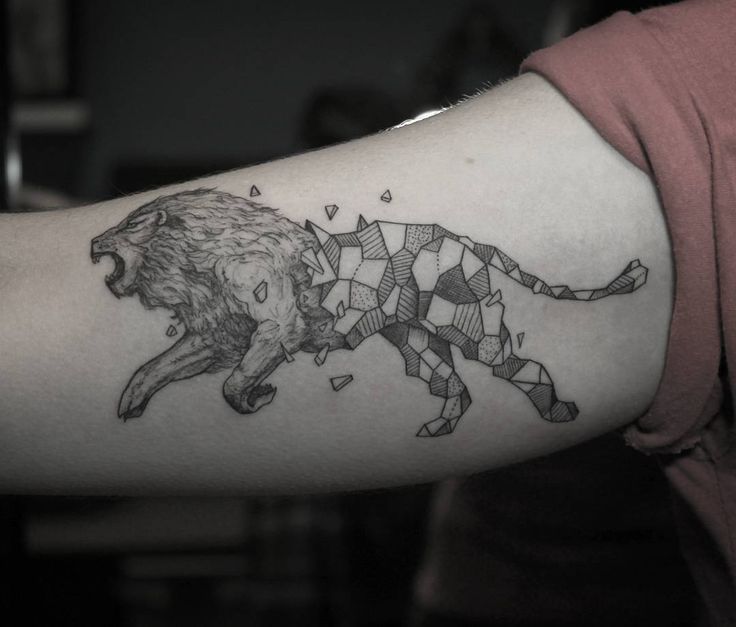 Geometric watercolor lion tattoo | Lion tattoo, Watercolor lion tattoo, Lion  tattoo design