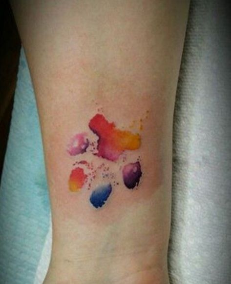 Body - Tattoo's - Colorful watercolor paw print tattoo by Milad ...