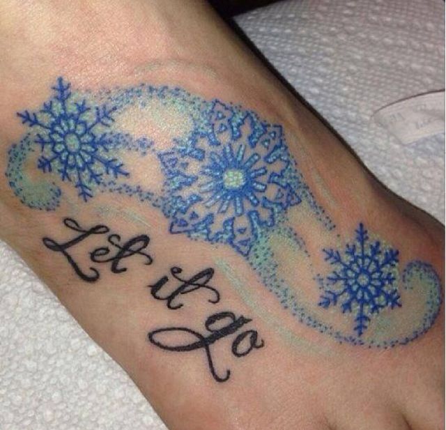Minimalist Frozen Tattoo with Follow Written in Blue Ink