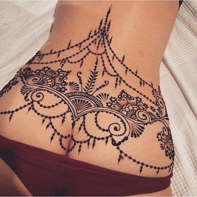 lower back jewel tattoos