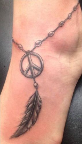 Sign Of Peace Tattoo On Arm - Tattoos Designs