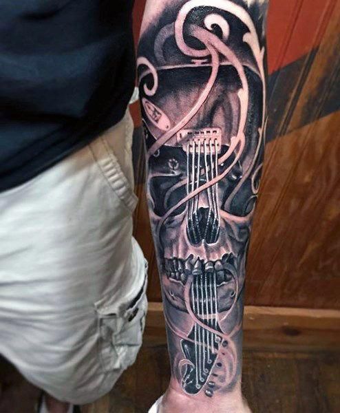 Men music tattoos for Music Tattoos