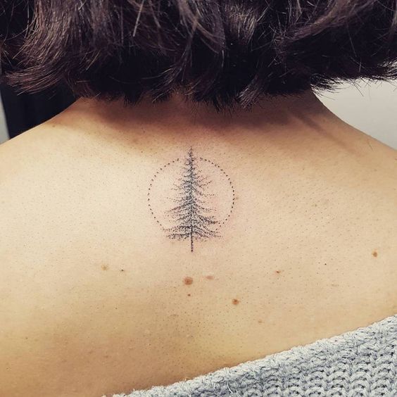 Tree Tattoo - Hand poked pine tree tattoo on the upper back ...