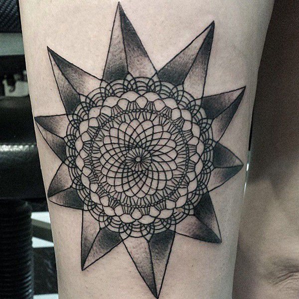 Polynesian Mandala tattoo with compass and abstract sun design