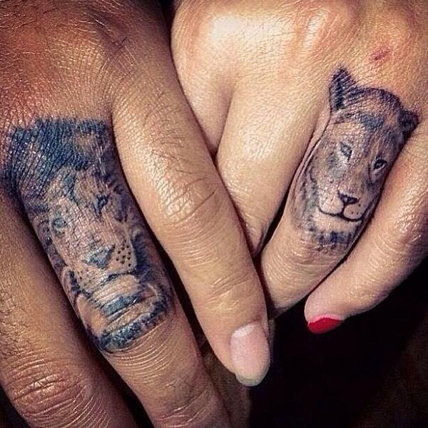 Matching king and queen chess pieces tattooed for